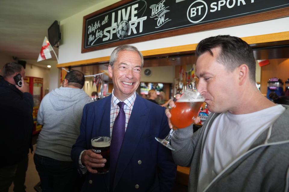 Reform UK leader Nigel Farage (left) and new Reform MP for South Basildon and East Thurrock, James McMurdock (right), during a visit to Wyldecrest Sports Country Club, Corringham, Essex. Picture date: Saturday July 6, 2024. (Photo by Joe Giddens/PA Images via Getty Images)