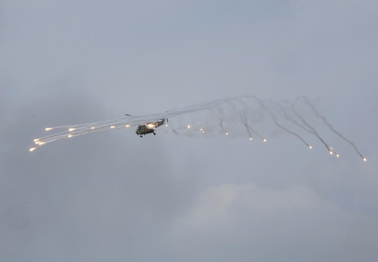 The South Korean army&#39;s Surion helicopter fires flares during South Korea-U.S. joint military drills at Seungjin Fire Training Field in Pocheon, South Korea, Thursday, May 25, 2023. (AP Photo/Ahn Young-joon)