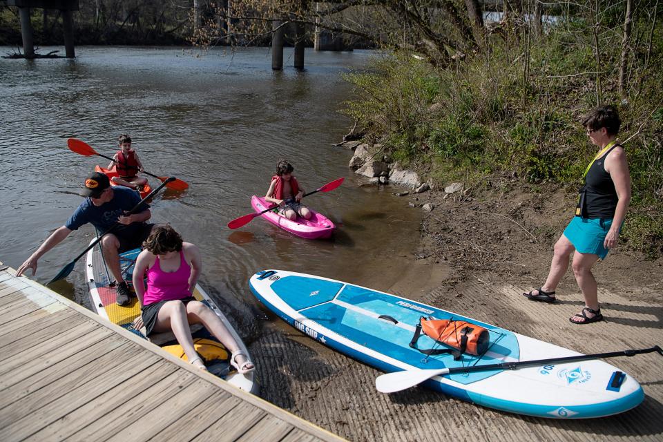 Becca Chambers, right, and her husband, John McKinney, took their children, Luke, James and Betty McKinney, on the family’s first French Broad River float of the year April 4, 2023, during their spring break. “I was going to swim but the water was too cold,” said Betty, 15, “but it was a pretty good day.”