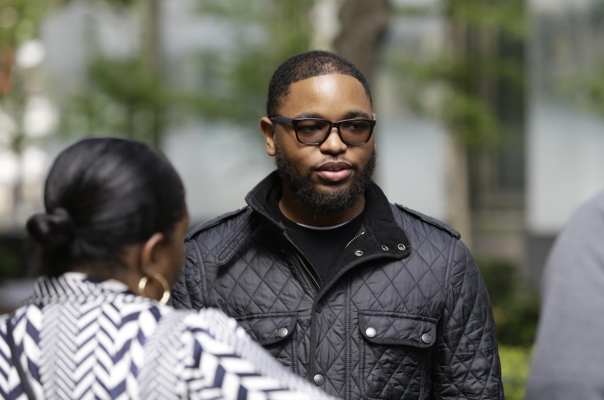 Christian Dawkins stands outside federal court Wednesday, May 8, 2019, in New York. Dawkins and youth basketball coach Merl Code were convicted on a conspiracy count, but acquitted of some other charges. (AP Photo/Frank Franklin II)