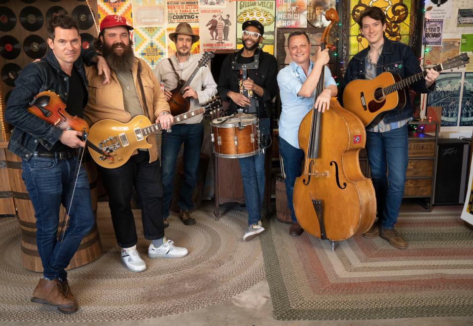 Old Crow Medicine Show members Ketch Secor, Mike Harris, Corry Younts, Jerry Pentecost, Morgan Jahnig and Mason Via pose for a portrait Thursday, April 7, 2022 in Nashville, Tenn. 