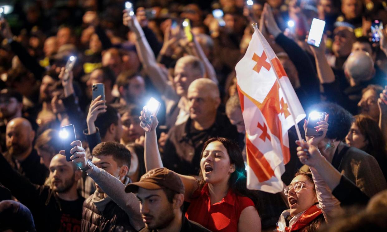 <span>Crowds of people protested outside parliament in Tbilisi on Monday and Tuesday, when they clashed with riot police.</span><span>Photograph: David Mdzinarishvili/EPA</span>