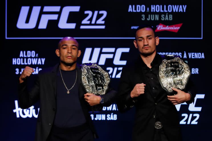 Max Holloway (R) hasn't lost a UFC fight in nearly four years, but he's facing an all-time legend in Jose Aldo. (Getty)