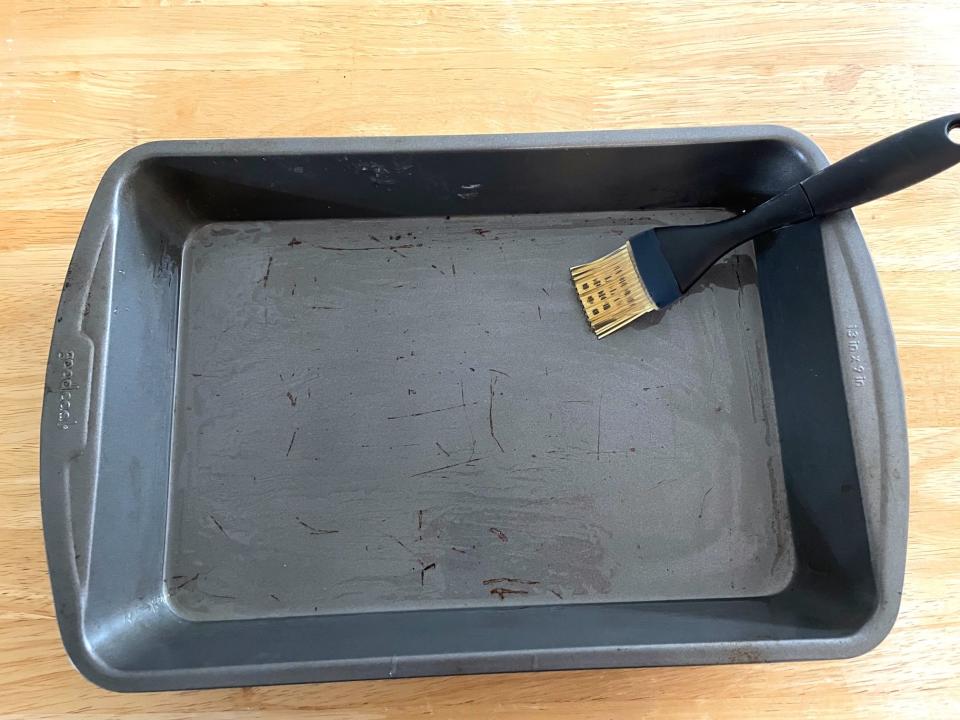 Brushing baking pan for Anneta's dad's baklava