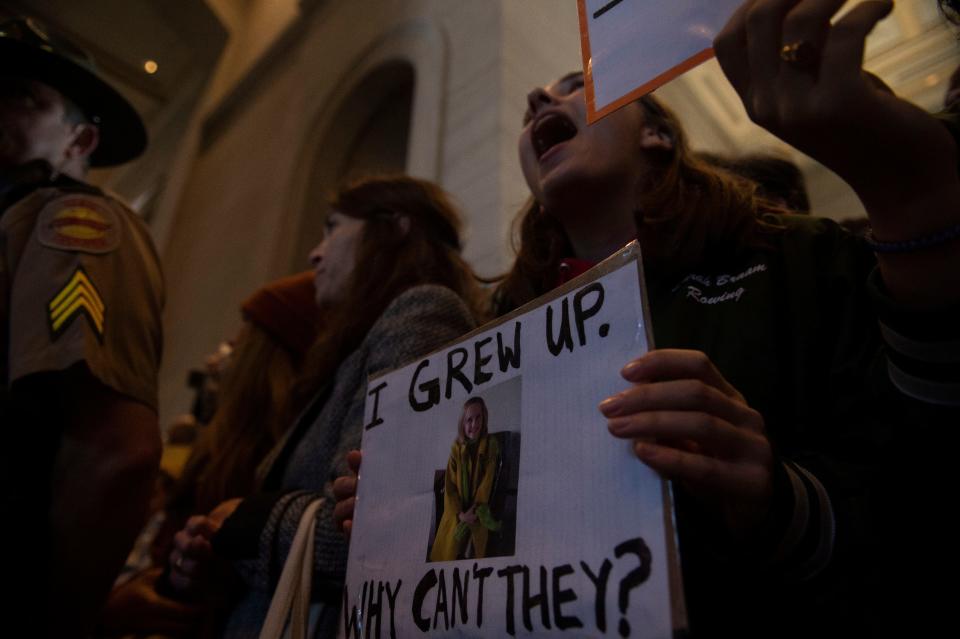 Protesters fill the capitol building as representatives make their way towards the House chamber doors at the State Capitol Building  in Nashville , Tenn., Thursday, March 30, 2023.