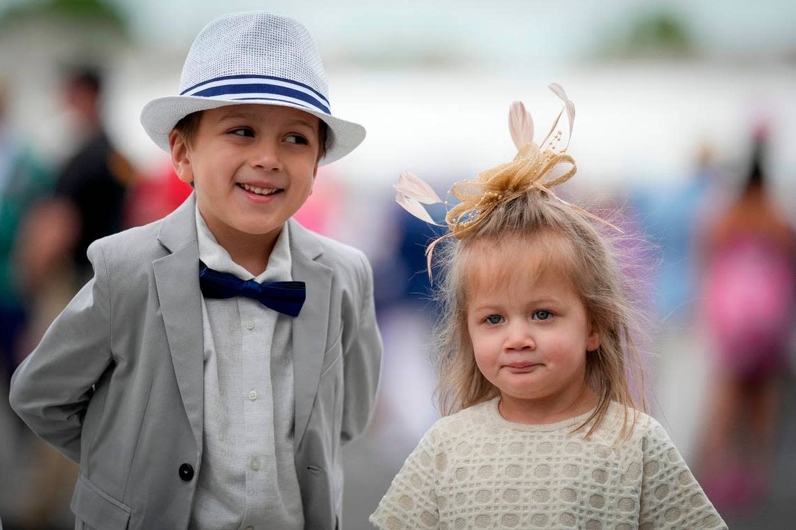 Children wait in line for their seats on the day of the 149th running of the Kentucky Derby at Churchill Downs Wednesday, May 3, 2023, in Louisville, Ky. (For the Herald Leader/Bryan Woolston) Bryan Woolston/AP