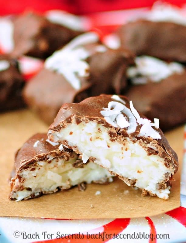 <p>Bake For Seconds</p><p>These 4-Ingredient Coconut Cream Bars are an easy, irresistible, no-bake candy that tastes like a Mounds bar! We make these every year! </p><p><strong>Get the recipe: <a href="https://backforseconds.com/4-ingredient-coconut-cream-bars/" rel="nofollow noopener" target="_blank" data-ylk="slk:4-Ingredient Coconut Cream Bars;elm:context_link;itc:0;sec:content-canvas" class="link rapid-noclick-resp">4-Ingredient Coconut Cream Bars</a></strong></p>