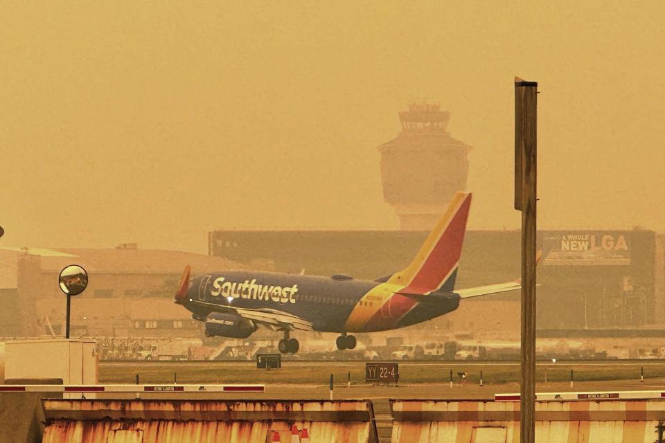 A Southwest airliner approaches LaGuardia Airport in New York on June 7.  / Credit: David R.Martin/AP