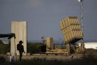 FILE - A battery of Israel's Iron Dome defense missile system, deployed to intercept rockets, sits in Ashkelon, southern Israel, Aug. 7, 2022. Israel is vowing to retaliate against Iran, risking further expanding the shadow war between the two foes into a direct conflict after an Iranian attack over the weekend sent hundreds of drones and missiles toward Israel. (AP Photo/Ariel Schalit, File)