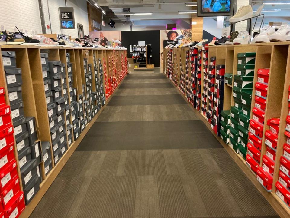 A fully-stocked aisle in DSW in NYC. - Credit: Shoshy Ciment/Footwear News