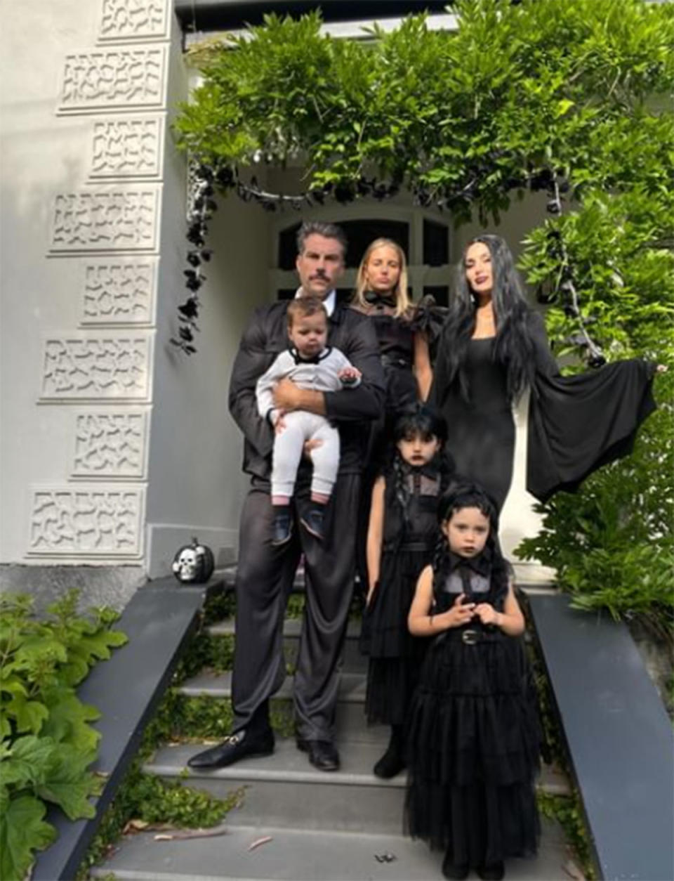 Sam and Snezana Wood and family on Halloween 2023 dressed as the Adams Family