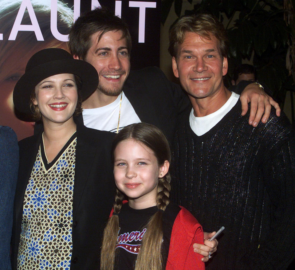 Executive producer Drew Barrymore (L), poses with fellow cast members
Jake Gyllenhaal, Patrick Swayze (R), and Daveigh Chase as they arrive
for the premiere of their new film "Donnie Darko" October 22, 2001 in
Hollywood. The film incorporates elements of science fiction, romance
and comedy while asking some of life's questions. The film opens in the
United States October 26. REUTERS/Rose Prouser

RMP/ME