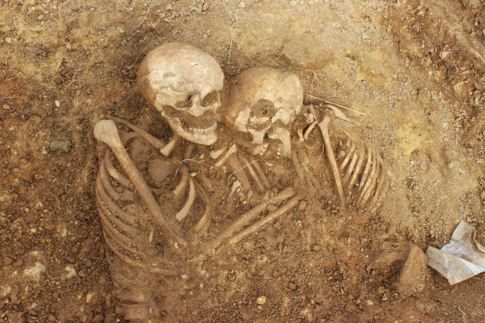 The skeletal remains of two bodies found at a burial site in Leeds, England, in spring 2022.  (West Yorkshire Joint Services / Leeds City Council)