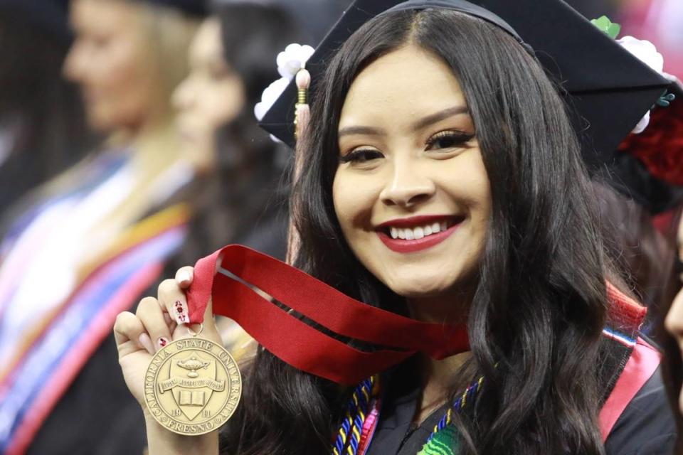 Fresno State’s Karina Ortega during the College of Health and Human graduation ceremony Saturday (May 21) morning at the Save Mart Center. Ortega was selected as the 2022 undergraduate dean’s medalist for the College of Health and Human . She earned her bachelor’s degree in social work with a 4.0 GPA.