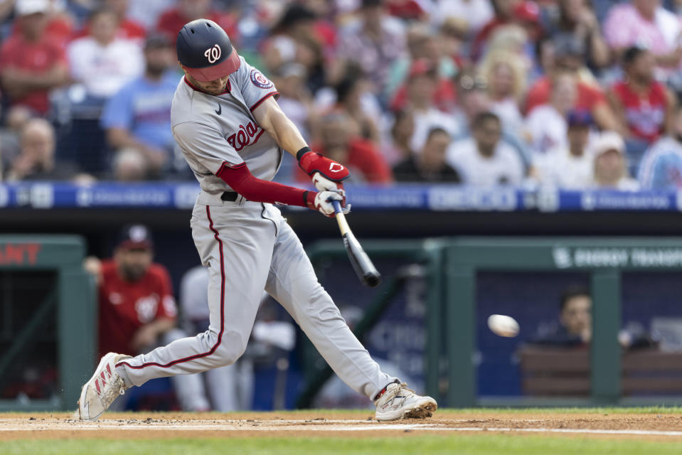 Washington Nationals' Trea Turner hits a single during the first inning of the team's baseball game against the Philadelphia Phillies, Tuesday, July 27, 2021, in Philadelphia. (AP Photo/Laurence Kesterson)