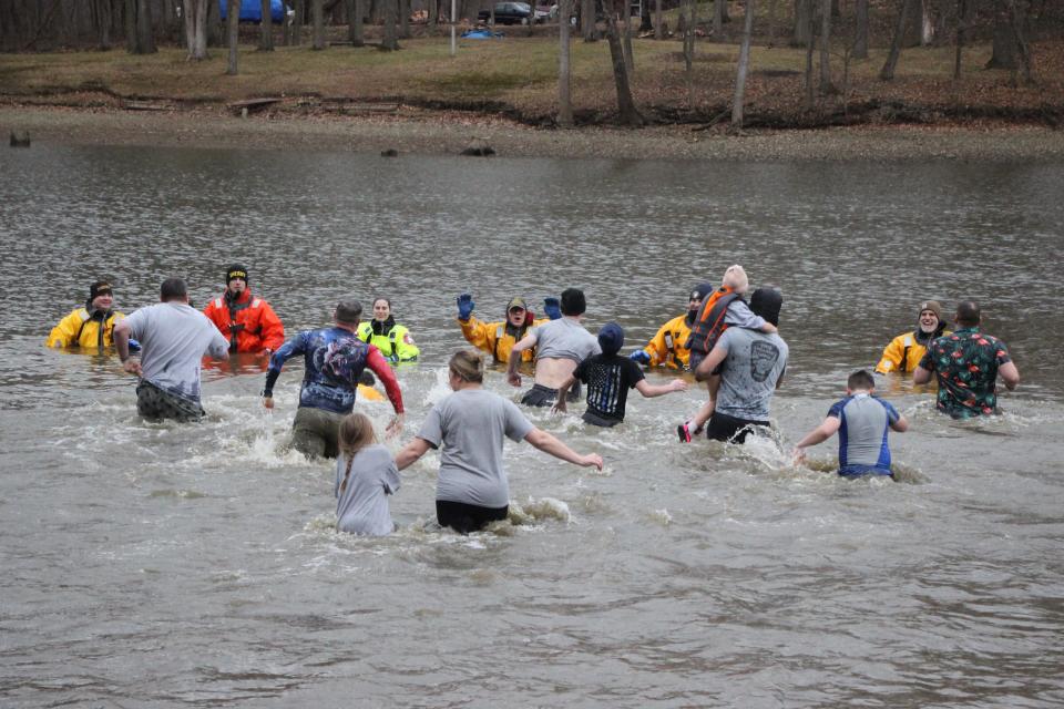 The annual Polar Bear Dip was held at Charles Mill Lake in Mifflin on New Year's Day. About 200 participants took the plunge in support of Ashland County Relay for Life and the American Cancer Society.