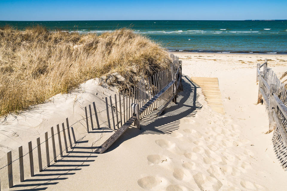 A boardwalk to a beach.