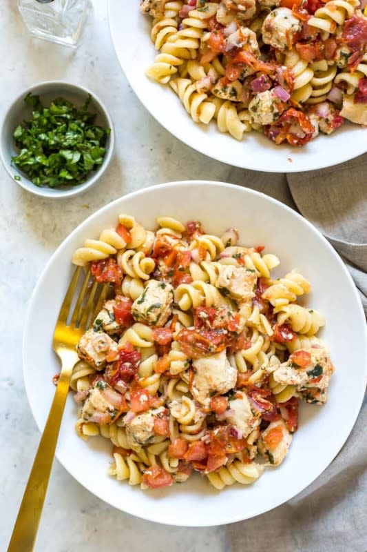 <p>The Girl on Bloor</p><p>This Instant Pot Bruschetta chicken pasta is a delicious one-pot pasta recipe that's perfect for summer and it comes together in 30 minutes!</p><p><strong>Get the recipe: <a href="https://thegirlonbloor.com/instant-pot-bruschetta-chicken-pasta/" rel="nofollow noopener" target="_blank" data-ylk="slk:Delicious Instant Pot Bruschetta Chicken Pasta;elm:context_link;itc:0;sec:content-canvas" class="link rapid-noclick-resp">Delicious Instant Pot Bruschetta Chicken Pasta</a></strong></p>