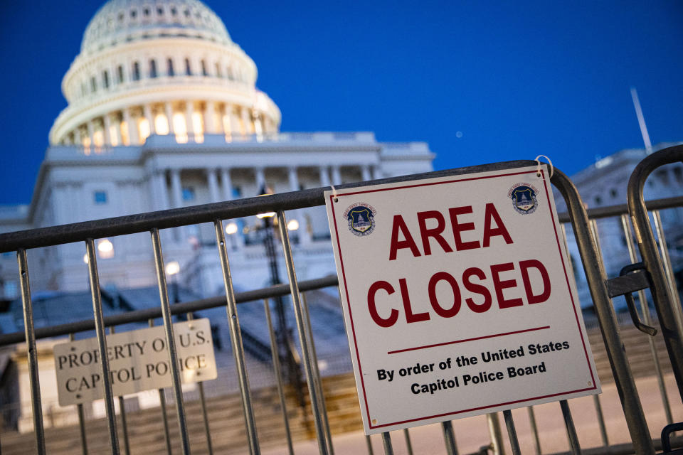 A sign denotes a portion of the West Front of the U.S. Capitol remains closed, as security fencing is removed on Sept. 19. Protesters gathered in Washington, D.C., for the '