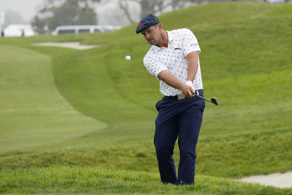 Bryson DeChambeau chips onto the second green during the second round of the U.S. Open Golf Championship, Friday, June 18, 2021, at Torrey Pines Golf Course in San Diego. (AP Photo/Marcio Jose Sanchez)