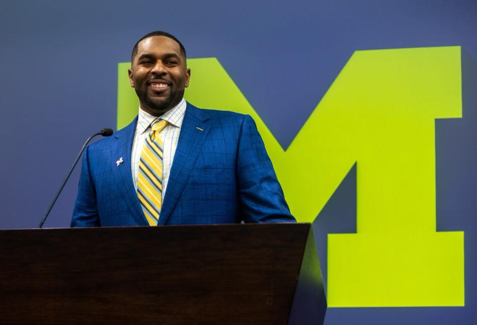 Sherrone Moore, Michigan’s new head coach, smiles as he speaks in front of family, media and University of Michigan faculty members during a press conference inside the Junge Family Champions Center in Ann Arbor on Saturday, Jan. 27, 2024.