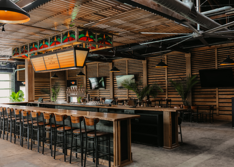 Burl Brew will open on March 1 with a central 30-seat bar made from a single oak tree. The bar also has table seating and will serve cocktails. Provided