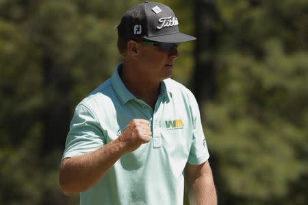 Charley Hoffman of the U.S. celebrates saving par on the first hole in third round play during the 2017 Masters golf tournament at Augusta National Golf Club in Augusta, Georgia, U.S., April 8, 2017. REUTERS/Brian Snyder