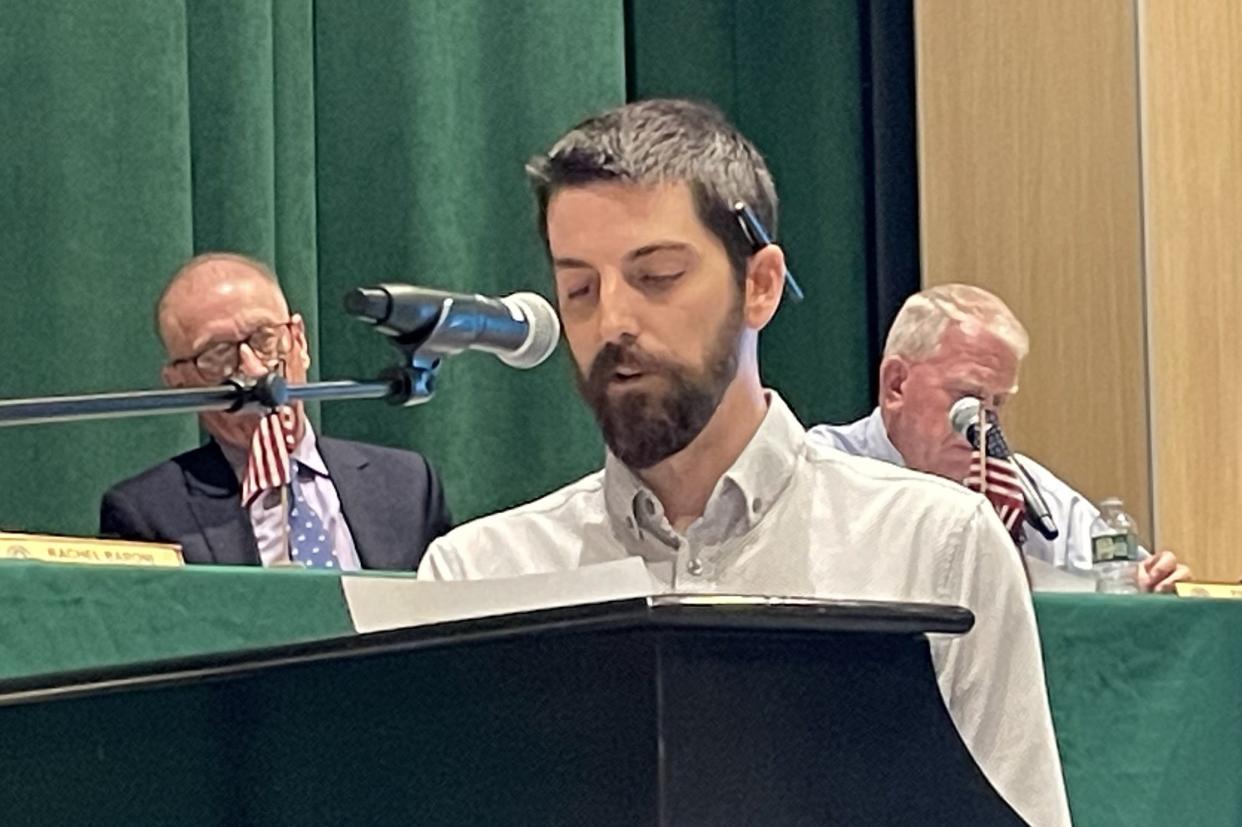 Dennis residents Kyle Pedicini presents a citizens’ petition to repeal the town’s ban on recreational marijuana establishments at the Dennis annual town meeting Tuesday. The proposal failed on a 130-98 vote, short of a required two-thirds majority.