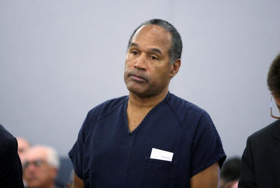 PHOTO: O.J. Simpson stands during sentencing at the Clark County Regional Justice Center, Dec. 5, 2008, in Las Vegas, Nevada. (Pool/Getty Images)