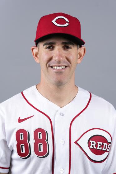 Alon Leichman, Cincinnati Reds assistant pitching coach, poses for a portrait.