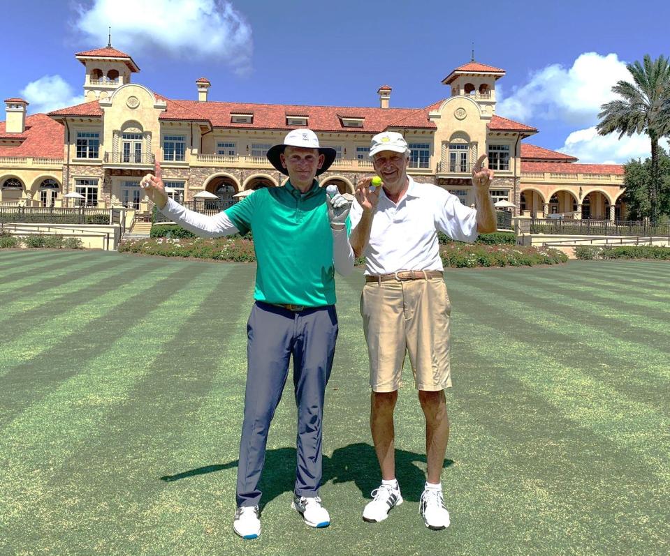 Todd Hand of Jacksonville (left) and Tom Lupinacci of Vilano Beach display the balls they used to make holes-in-one during the same round at the Players Stadium Course at TPC Sawgrass on Sept. 13.