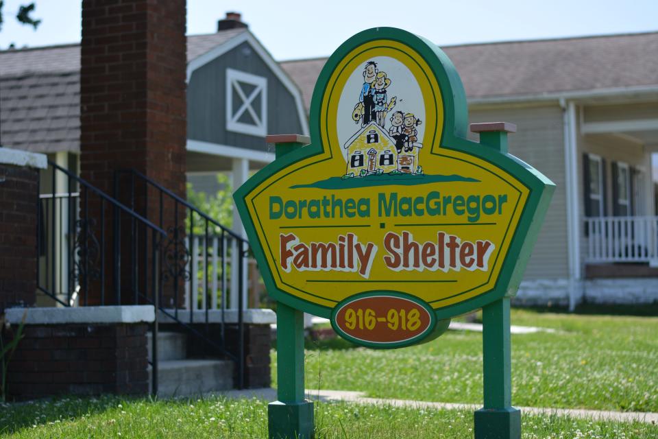A sign advertises the Dorathea MacGregor Homeless Shelter on June 2, 2023. Federal prosecutors accused Pigeon Township Trustee Mariama Wilson and two others of inflating the shelter's renovation costs in furtherance of an alleged "kickback scheme."