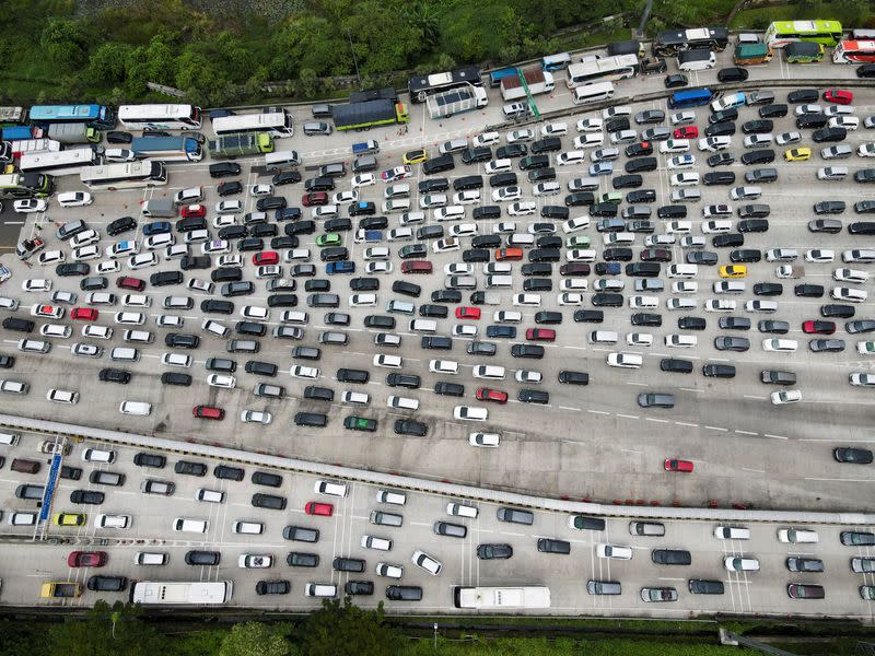 A general view of a traffic jam at a toll booth of a highway as Indonesian Muslims return to their hometowns to celebrate Eid al-Fitr, known locally as 'Mudik', in Karawang Regency