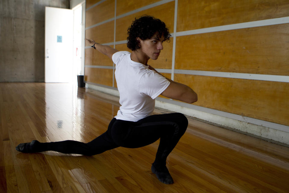 In this Aug. 15, 2012 photo, Isaac Hernandez, Mexico's most internationally acclaimed male ballet dancer, rehearses in Mexico City. Hernandez wants to change ballet in Mexico and aims to lead his countrymen to the practice barre in hopes they will grab on and get hooked, just as he did as a boy. (AP Photo/Dario Lopez-Mills)