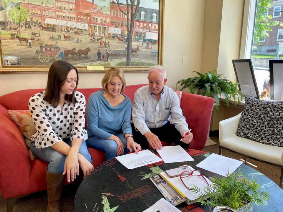 From left: Lizzie Ruffner, Florence Ruffner and John Dal Santo discuss the town's Memorial Day parade set for Monday, May 27. The event starts at 10 a.m. and will be held at Swasey Parkway and wind along Front Street to Gale Park.