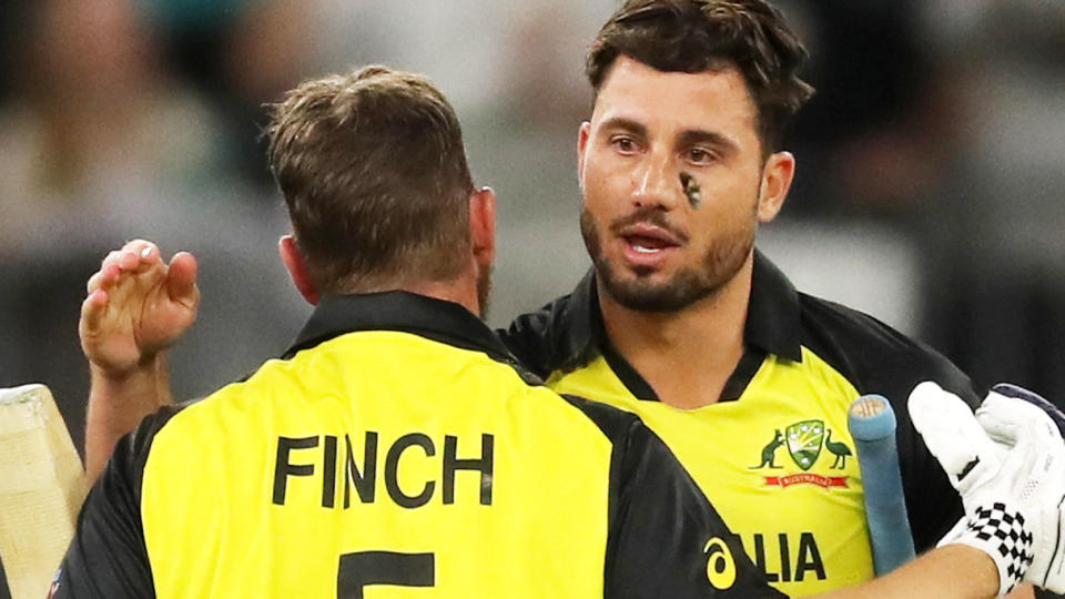 Marcus Stoinis embraces Aaron Finch after Australia defeated Sri Lanka at the T20 World Cup.