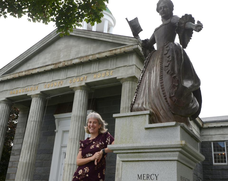 Leslie Dominguez-Santos, Barnstable County Human Rights Advisory Commission coordinator, stands outside the Barnstable Superior Courthouse where her office is located.