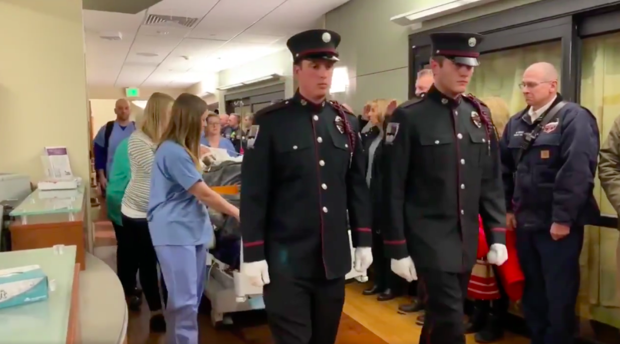 Firefighters led a heartbreaking procession for their fallen brother, Cody Mooney. (Photo: Courtesy of Twitter/South Metro Fire Rescue)