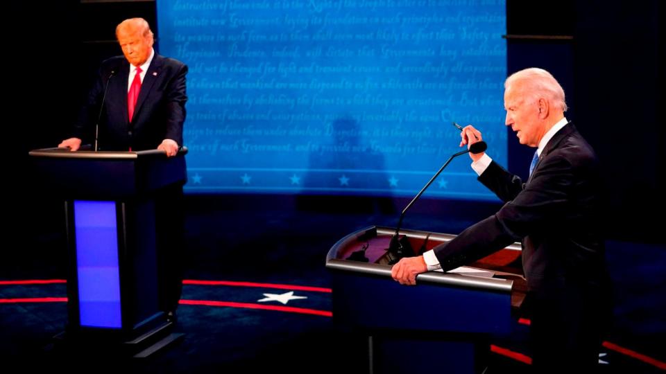 PHOTO: Joe Biden speaks, as President Donald Trump, left, listens during the U.S. presidential debate at Belmont University in Nashville, Tennessee, Oct. 22, 2020. (Morry Gash/AP/Bloomberg via Getty Images)