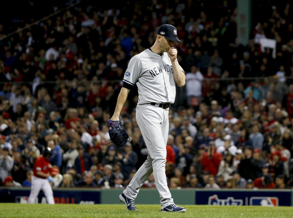 New York Yankees starting pitcher J.A. Happ leaves during the third inning against the Boston Red Sox in Game 1 of a baseball American League Division Series on Friday, Oct. 5, 2018, in Boston. (AP Photo/Elise Amendola)