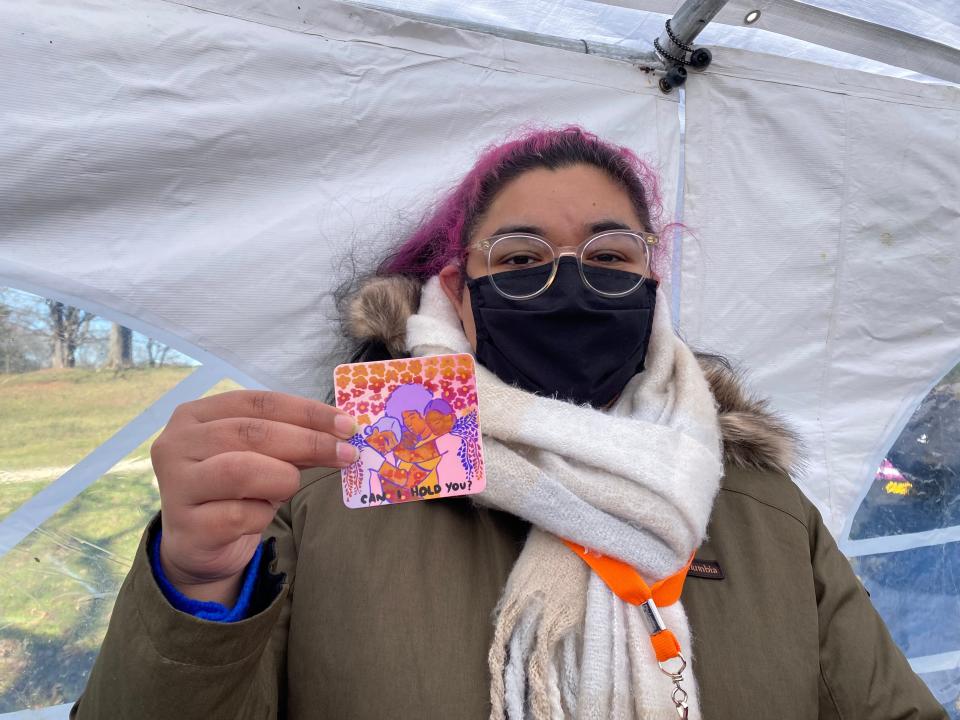 Lillian Luna, 21, identifies as Latinx and volunteers for the AAAJ. Luna said she hopes Latinx, Black and Asian communities can join together to fight for one another.