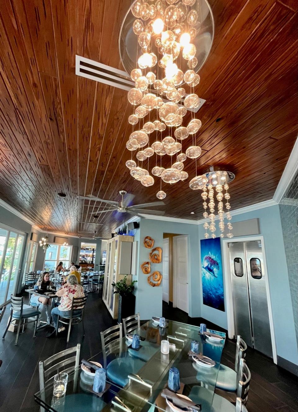 High Tide Social House's dining room has a marine life theme.