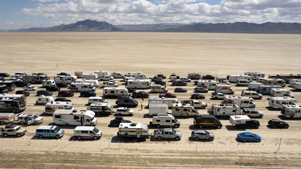 Thousands of people waited hours Monday to leave Burning Man in Nevada's Black Rock City.  - Matt Mills McKnight/Reuters