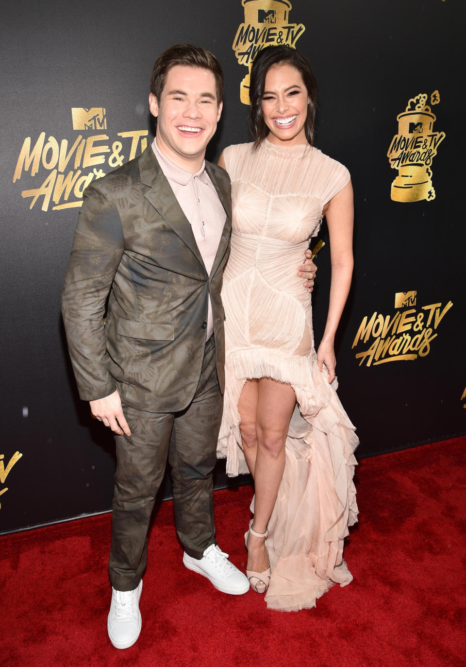 Host Adam DeVine (L) and actor Chloe Bridges attend the 2017 MTV Movie And TV Awards at The Shrine Auditorium on May 7, 2017 in Los Angeles, California.&nbsp;