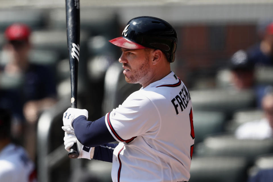 Atlanta Braves first baseman Freddie Freeman (5) drives in two runs with a base hit in the fifth inning of a baseball game against the Philadelphia Phillies Thursday, Sept. 19, 2019, in Atlanta. (AP Photo/John Bazemore)