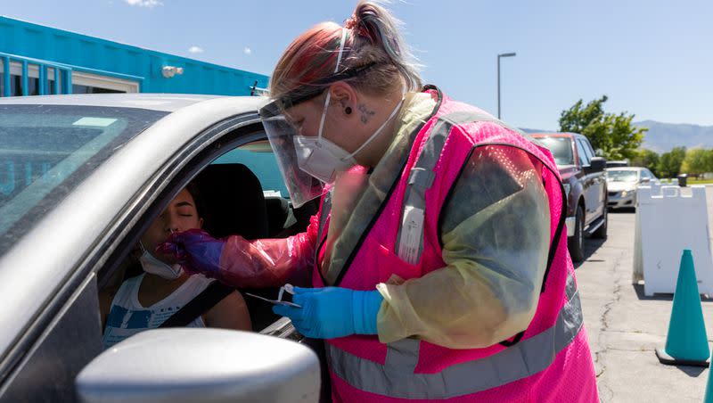 Megan Clay administers a COVID-19 test to Angel Alsammarraie in West Valley City on July 6, 2022. The World Health Organization is worried about a new strain of COVID-19.