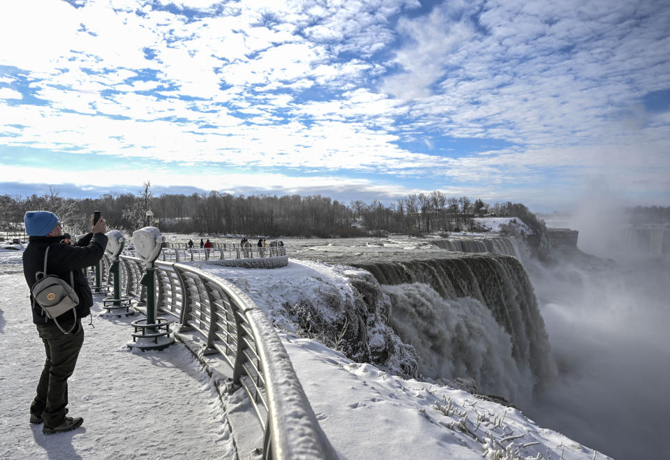 Tourists visit Niagara Falls as it turns into a winter spectacle.  / Credit: Fatih Aktas/Anadolu Agency via Getty Images