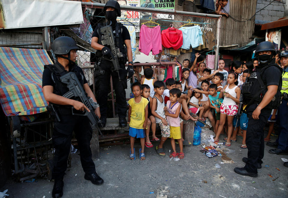 Members of Philippine National Police SWAT team stand guard