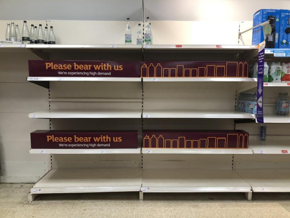 Empty shelves and signs on the soft drinks aisle of a Sainsbury’s store in Blackheath, Rowley Regis in the West Midlands. (PA Wire)