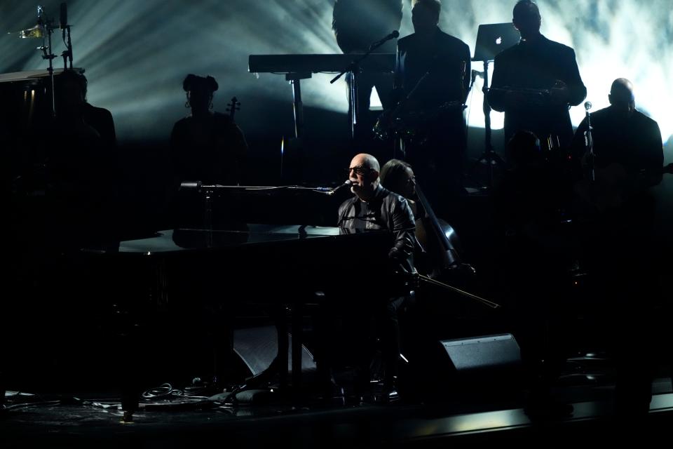 Billy Joel performs u0022Turn The Lights Back Onu0022 during the 66th Annual Grammy Awards.